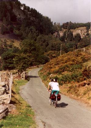 [Photo of Duncan and Ruth on a Tandem]